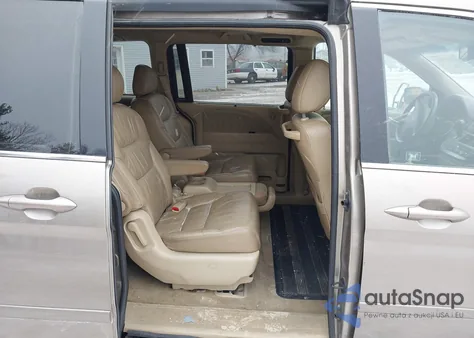 2010 Honda Odyssey Ex-L z USA, uszkodzony, nr VIN 5FNRL3H64AB076204